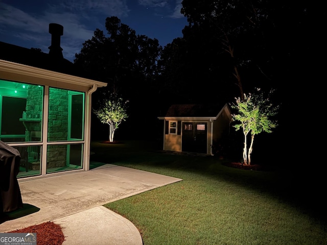 4100 Secret Shoals Way, Buford, GA 30518 - view of green lawn with an outbuilding and a patio area