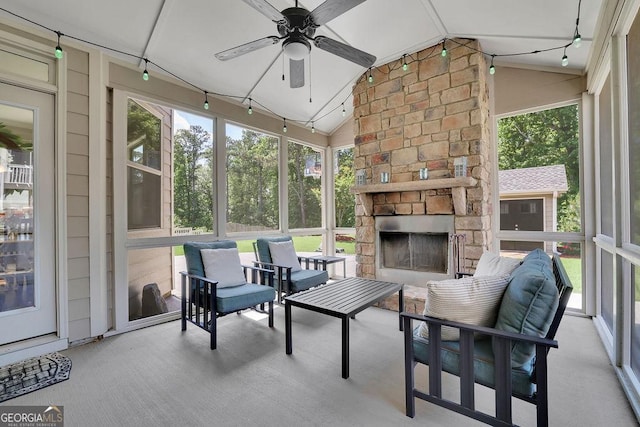 4100 Secret Shoals Way, Buford, GA 30518 - sunroom / solarium featuring an outdoor stone fireplace, lofted ceiling, and ceiling fan