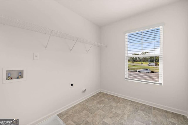 laundry room featuring hookup for an electric dryer, baseboards, and hookup for a washing machine