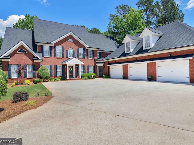 219 Eagles Landing Way, Mcdonough, GA 30253 - view of front of property featuring concrete driveway, brick siding, a garage, and roof with shingles