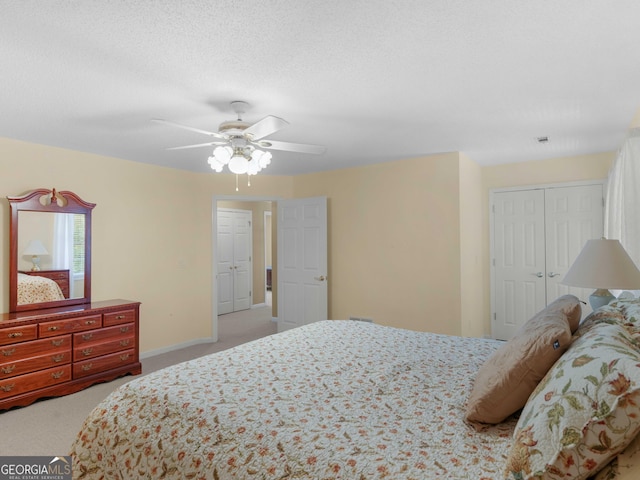 219 Eagles Landing Way, Mcdonough, GA 30253 - bedroom with carpet flooring, a closet, and a ceiling fan