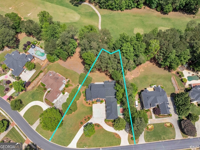 aerial perspective of suburban area with property parcel outlined
