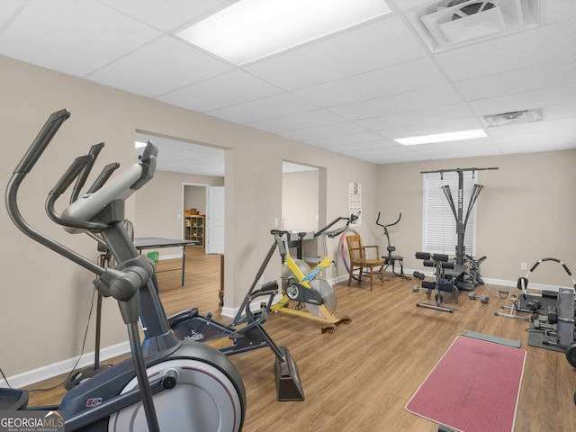 219 Eagles Landing Way, Mcdonough, GA 30253 - exercise room with a paneled ceiling and wood finished floors