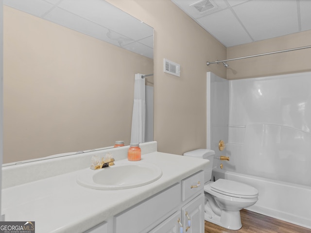 219 Eagles Landing Way, Mcdonough, GA 30253 - full bath with vanity, a drop ceiling, wood finished floors, and shower / bath combo