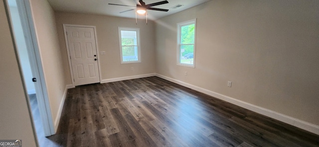 110 Forrest Ave, Jackson, GA 30233 - empty room with a ceiling fan, baseboards, and dark wood finished floors