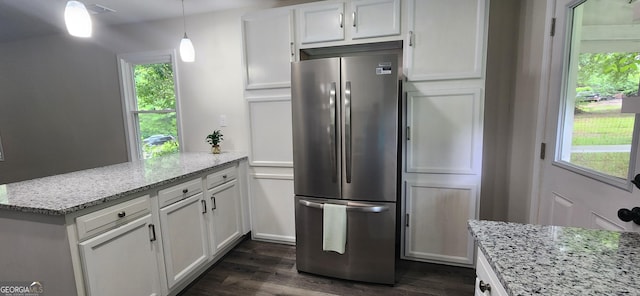 110 Forrest Ave, Jackson, GA 30233 - kitchen with freestanding refrigerator, dark wood-type flooring, white cabinetry, a peninsula, and plenty of natural light