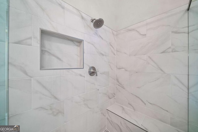 bathroom view of a tile shower