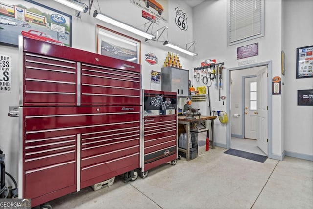 garage featuring baseboards