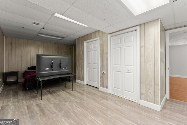 5103 Whispering Pines Dr, Gainesville, GA 30504 - sitting room featuring a paneled ceiling, wood finished floors, baseboards, and wooden walls