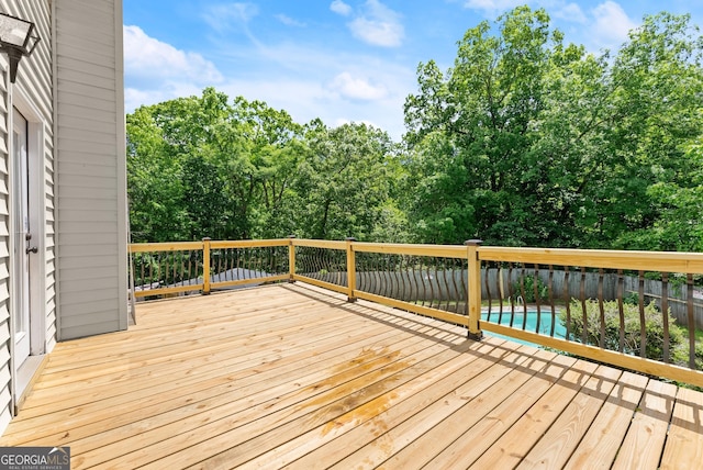 5103 Whispering Pines Dr, Gainesville, GA 30504 - wooden deck with view of wooded area