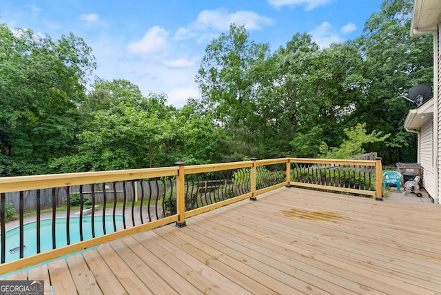 deck with view of scattered trees