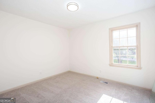 315 Henson Cir, Carrollton, GA 30117 - spare room with carpet and baseboards