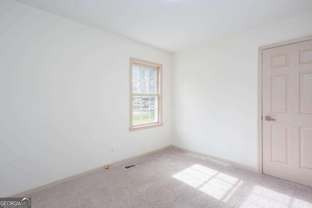 315 Henson Cir, Carrollton, GA 30117 - empty room featuring carpet flooring and baseboards