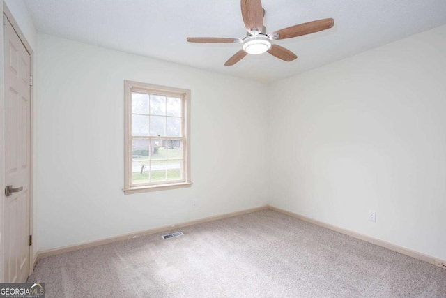 315 Henson Cir, Carrollton, GA 30117 - carpeted spare room with ceiling fan and baseboards