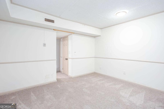 315 Henson Cir, Carrollton, GA 30117 - finished basement featuring light colored carpet, baseboards, and a textured ceiling