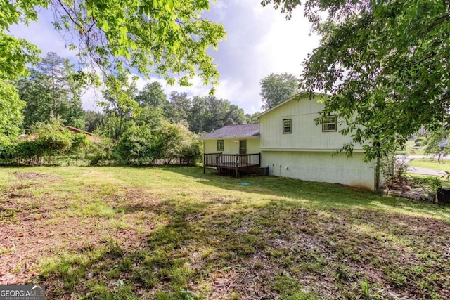 315 Henson Cir, Carrollton, GA 30117 - view of green lawn with a wooden deck