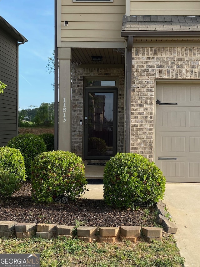 11813 Lovejoy Crossing Blvd, Hampton, GA 30228 - doorway to property featuring brick siding
