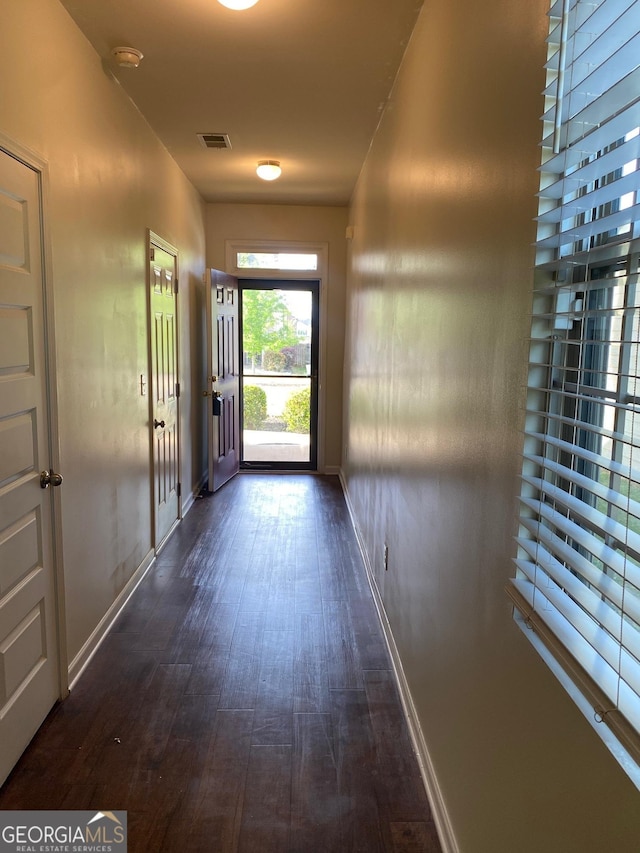11813 Lovejoy Crossing Blvd, Hampton, GA 30228 - hallway featuring baseboards and dark wood-style flooring