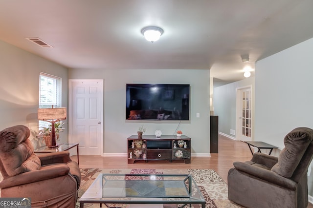 5960 Bridge Stone Ct, Cumming, GA 30028 - living room with wood finished floors and baseboards