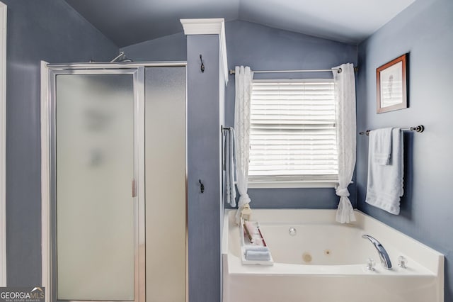 5960 Bridge Stone Ct, Cumming, GA 30028 - bathroom featuring lofted ceiling, a tub with jets, and a shower stall