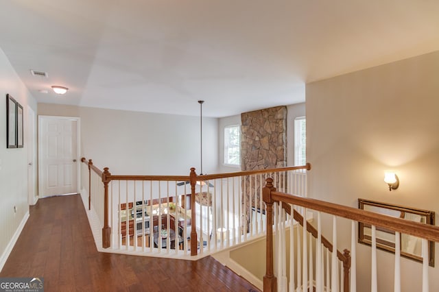 5960 Bridge Stone Ct, Cumming, GA 30028 - corridor with an upstairs landing, wood finished floors, and baseboards