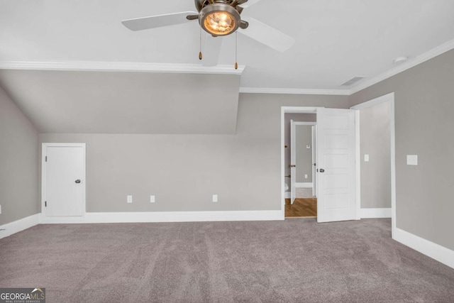 bonus room featuring carpet floors, ceiling fan, and baseboards