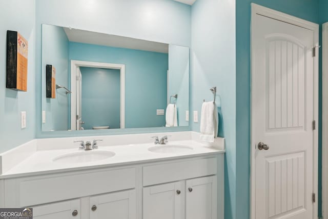 42 Waterfall Ct, Dawsonville, GA 30534 - bathroom with double vanity and toilet