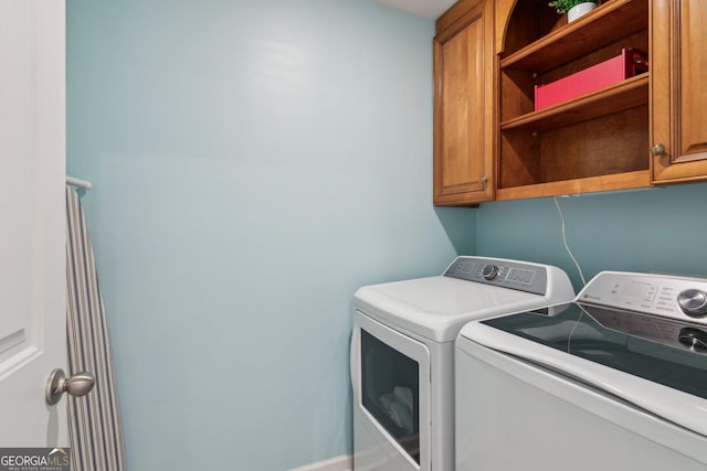 42 Waterfall Ct, Dawsonville, GA 30534 - laundry room with independent washer and dryer and cabinet space