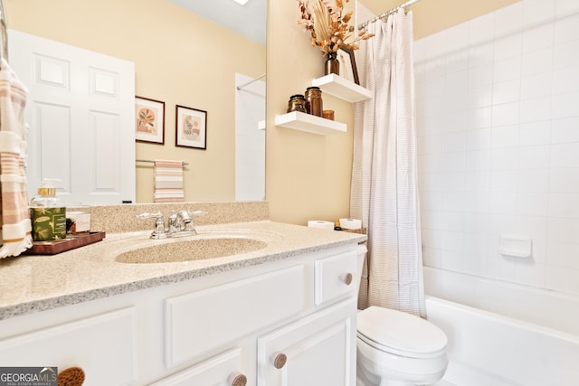 full bath with toilet, vanity, and shower / bath combo