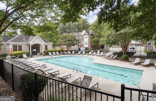 1996 Cobblestone Cir NE, Brookhaven, GA 30319 - community pool featuring fence and a patio