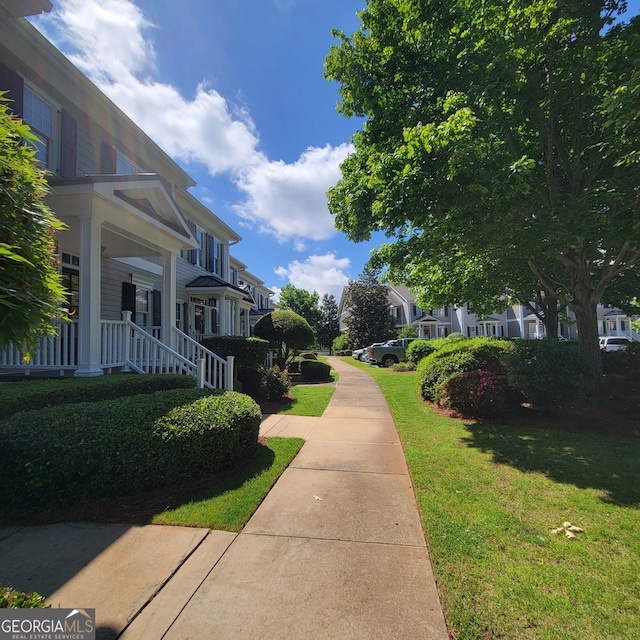 175 Lakeview Dr Apt 102, Eatonton, GA 31024 - view of property's community with a residential view and a yard