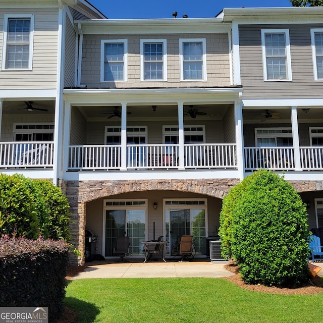 175 Lakeview Dr Apt 102, Eatonton, GA 31024 - rear view of house with ceiling fan, central AC, a patio area, and a balcony