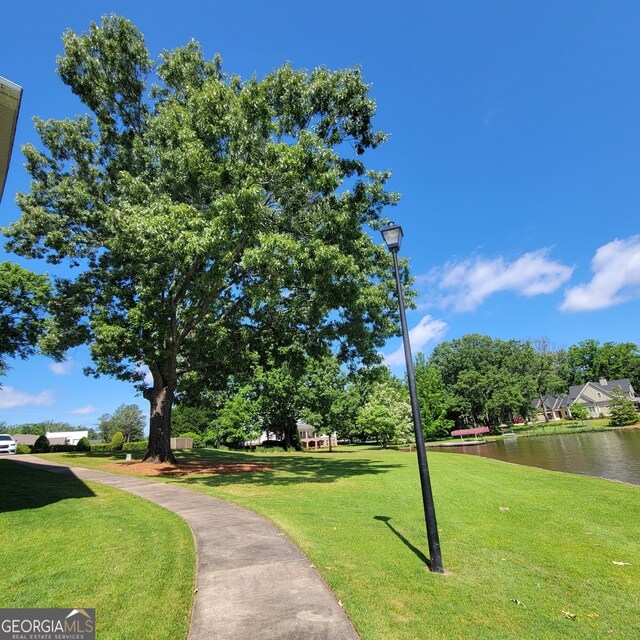 175 Lakeview Dr Apt 102, Eatonton, GA 31024 - view of property's community featuring a yard and a water view