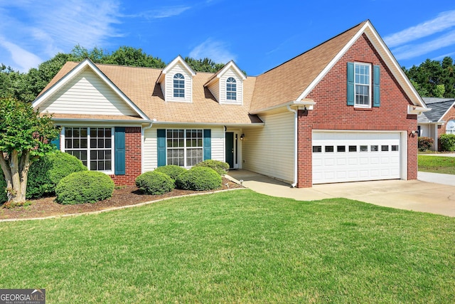 traditional-style house featuring concrete driveway, a front lawn, a shingled roof, and brick siding