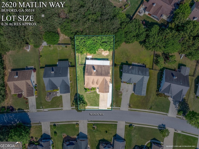 aerial perspective of suburban area with property parcel outlined
