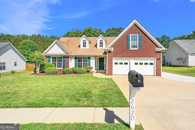 traditional home with brick siding, concrete driveway, and a front lawn