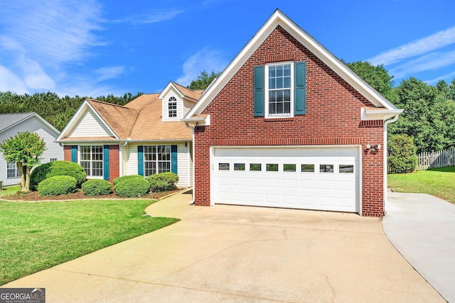 traditional-style house with concrete driveway, brick siding, and a garage
