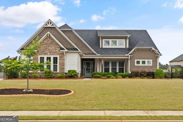 170 Oakleigh Manor Dr, Fayetteville, GA 30215 - craftsman inspired home featuring a front yard, stone siding, and roof with shingles