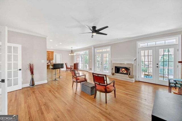 328 Broadmoor Way, Mcdonough, GA 30253 - living room featuring french doors, ornamental molding, light wood finished floors, a ceiling fan, and recessed lighting