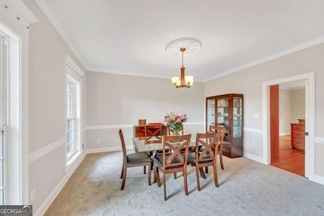 328 Broadmoor Way, Mcdonough, GA 30253 - carpeted dining space with crown molding, a chandelier, baseboards, and french doors