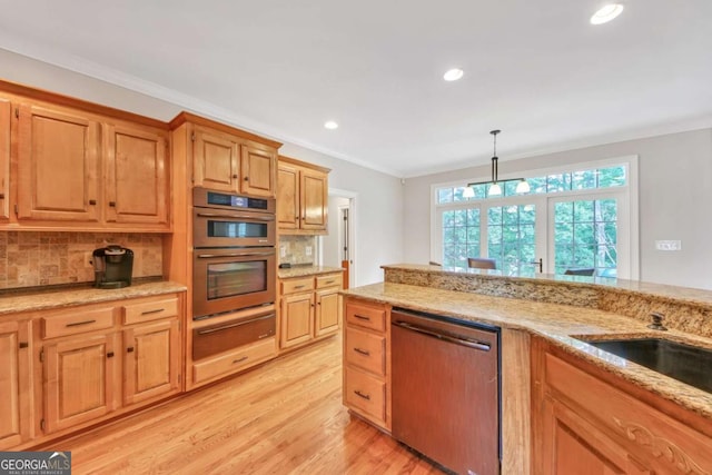 328 Broadmoor Way, Mcdonough, GA 30253 - kitchen with stainless steel appliances, a warming drawer, backsplash, light wood-type flooring, and recessed lighting