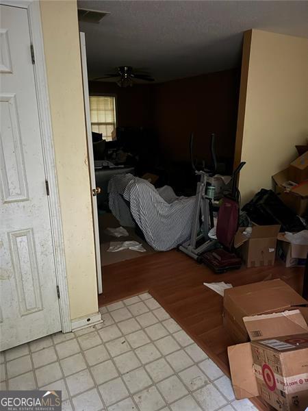 bedroom featuring light wood-style flooring