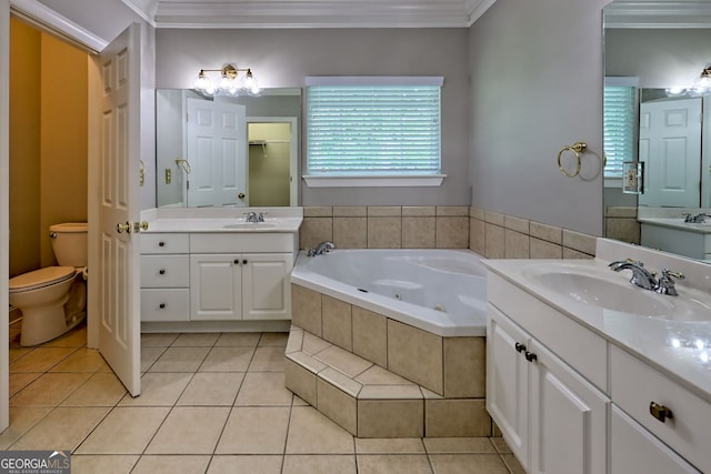 full bath with crown molding, tile patterned flooring, a tub with jets, two vanities, and toilet