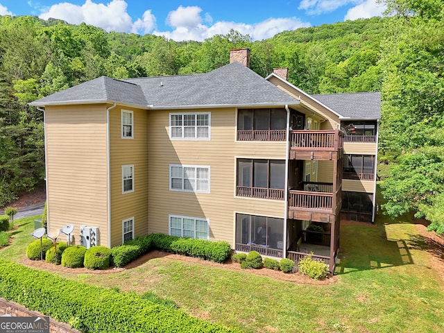 112 Glen Eagle Ct Unit 303, Clayton, GA 30525 - view of building exterior with a view of trees
