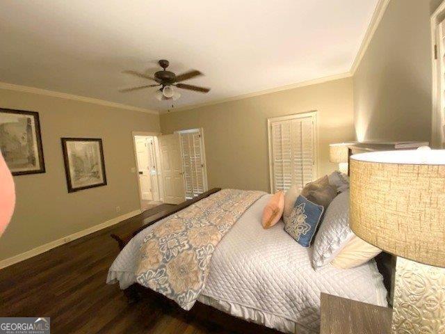 3132 Ingleside Ave, Macon, GA 31204 - bedroom with wood finished floors, crown molding, baseboards, and a ceiling fan