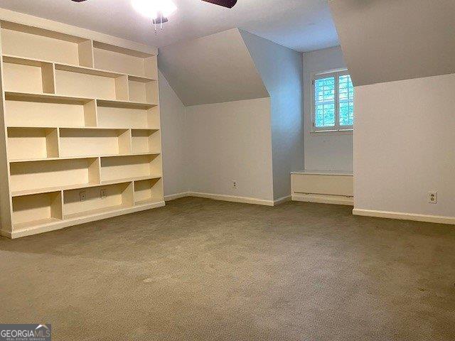 3132 Ingleside Ave, Macon, GA 31204 - bonus room with ceiling fan, vaulted ceiling, dark carpet, and baseboards