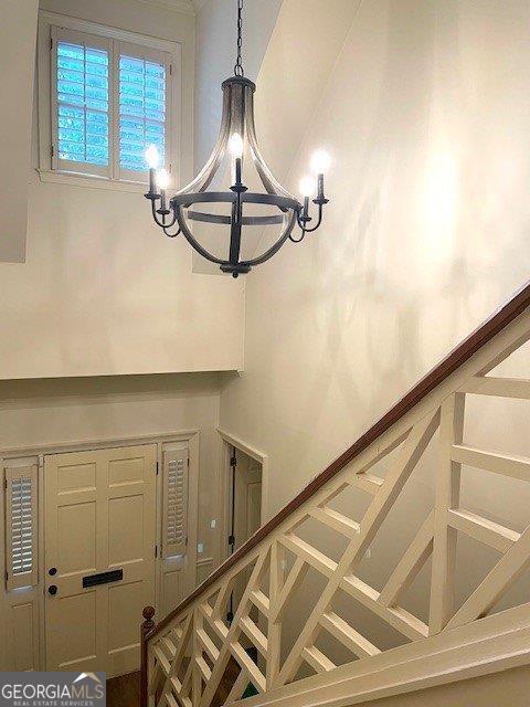 3132 Ingleside Ave, Macon, GA 31204 - stairway featuring a chandelier