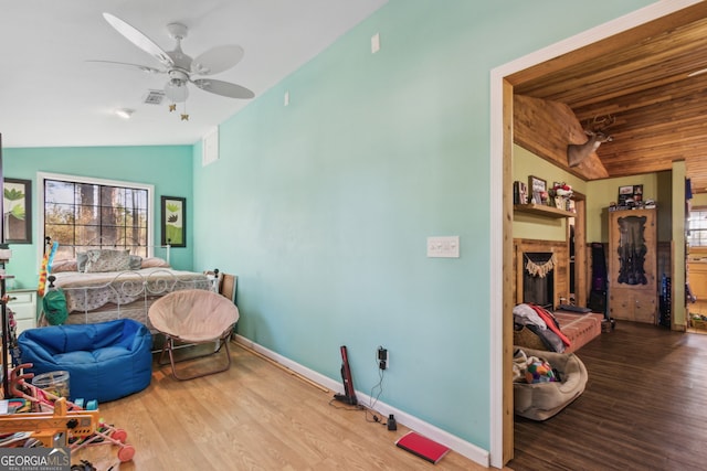 328 Willow Creek Rd, Folkston, GA 31537 - bedroom with wood finished floors, lofted ceiling, baseboards, and ceiling fan