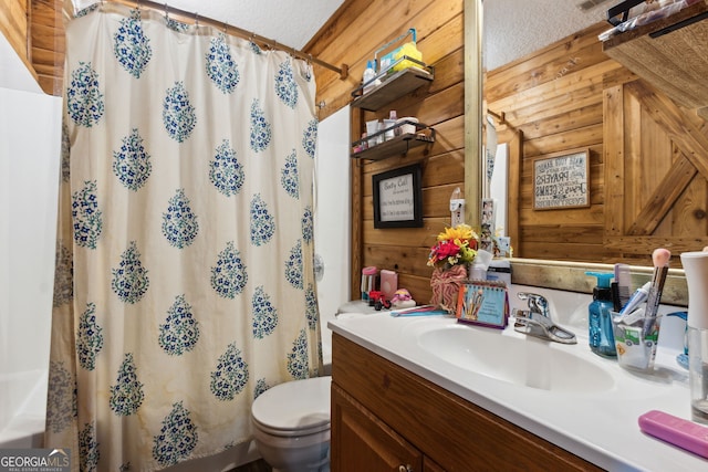 328 Willow Creek Rd, Folkston, GA 31537 - bathroom with toilet, vanity, a shower with curtain, and wooden walls