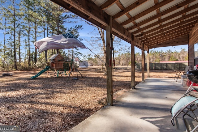 328 Willow Creek Rd, Folkston, GA 31537 - view of patio / terrace featuring a playground and fence